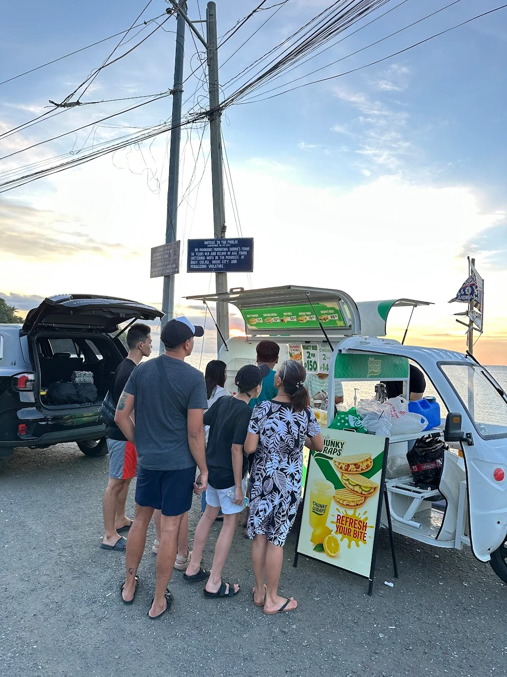 Customers chatting over Chunky Wraps